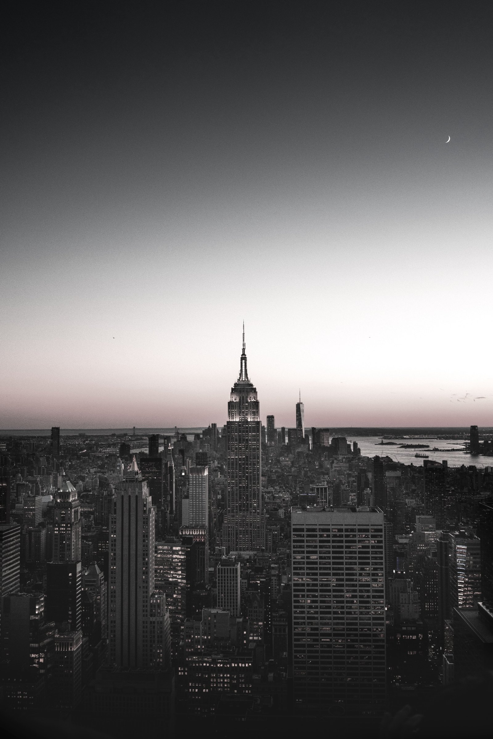 Manhattan skyline at dusk with the Empire State Building