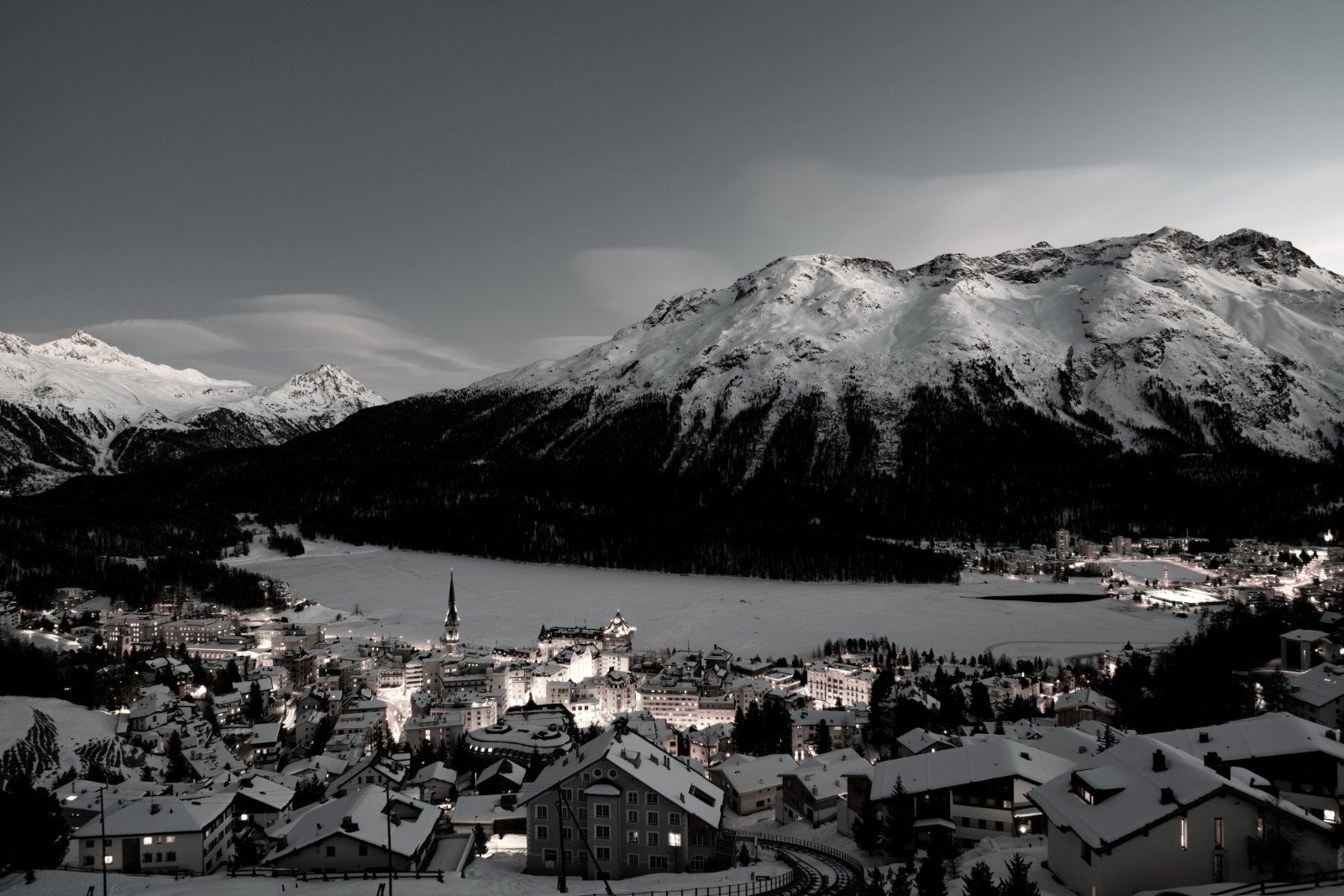 Wide black-and-white landscape of the frozen Lake St.