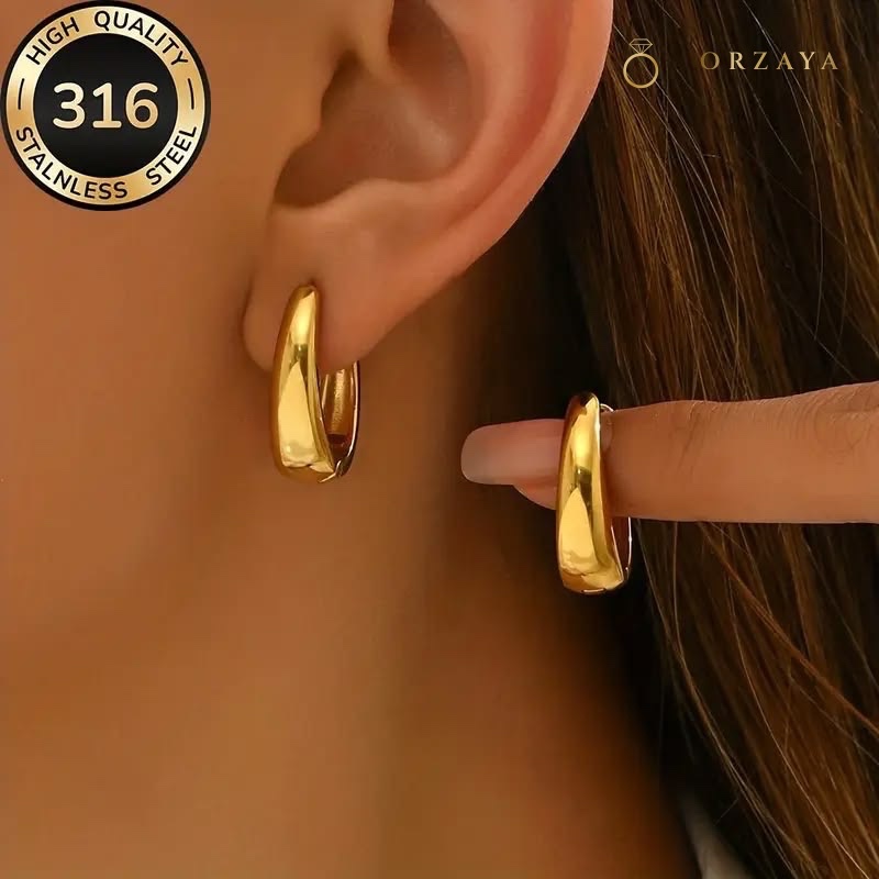 Aura Curved Horn Earrings — earrings in 316L Stainless Steel