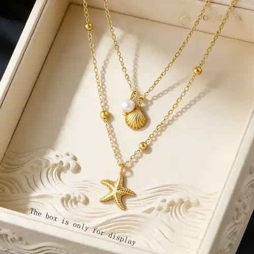 Solstice Seashell and Starfish Necklace — necklace in 316L Stainless Steel