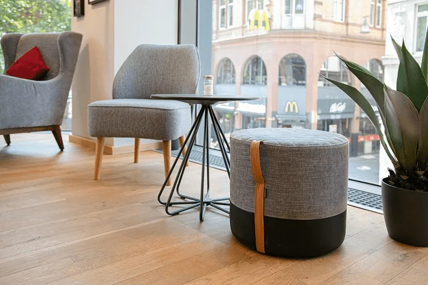 Armchair Cliff in a reference hospitality setting