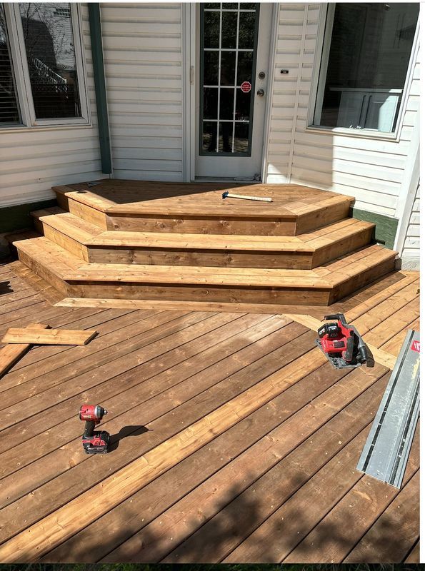 Custom stairs on a brand new deck build
