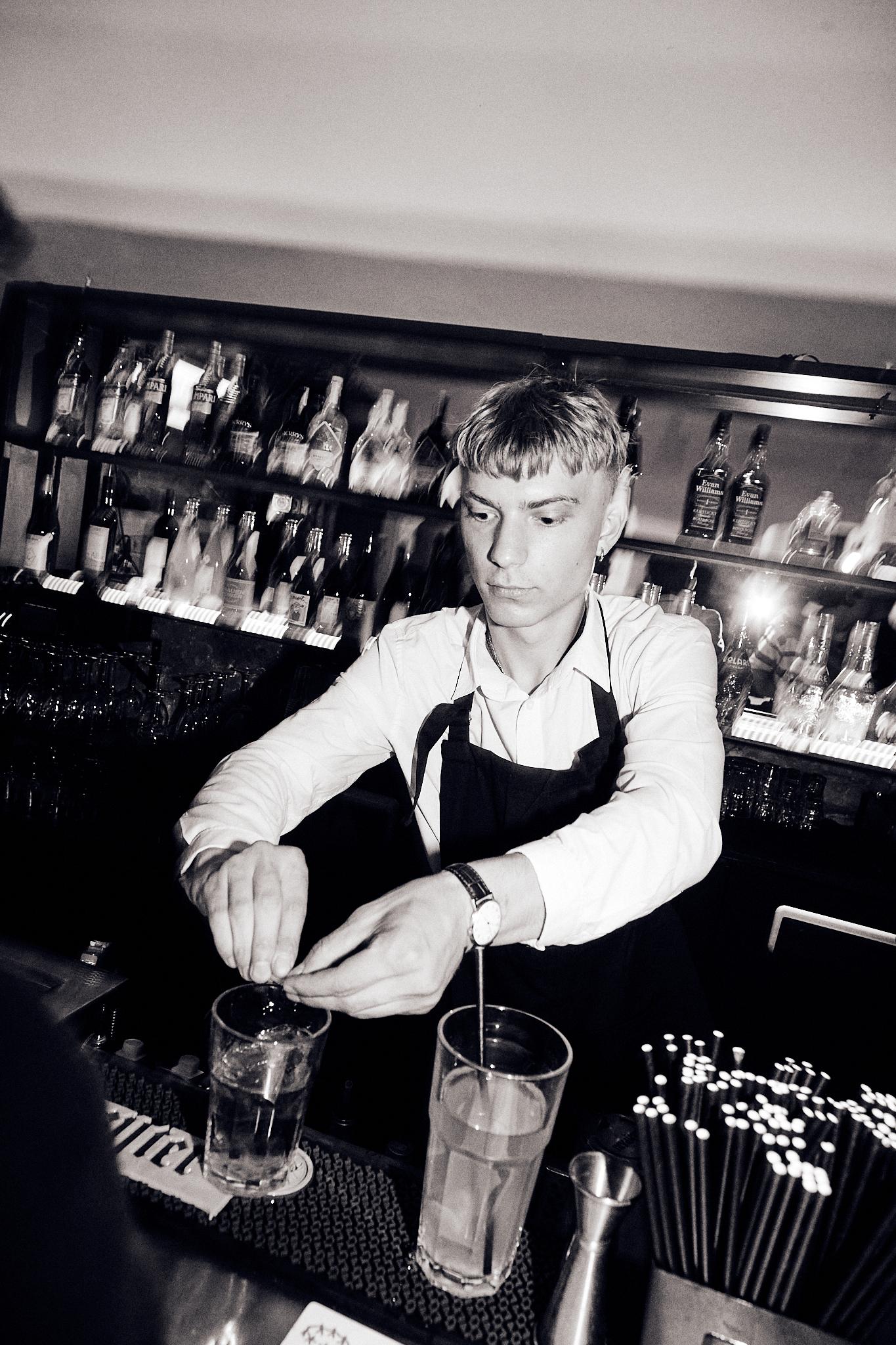 Bartender preparing drinks