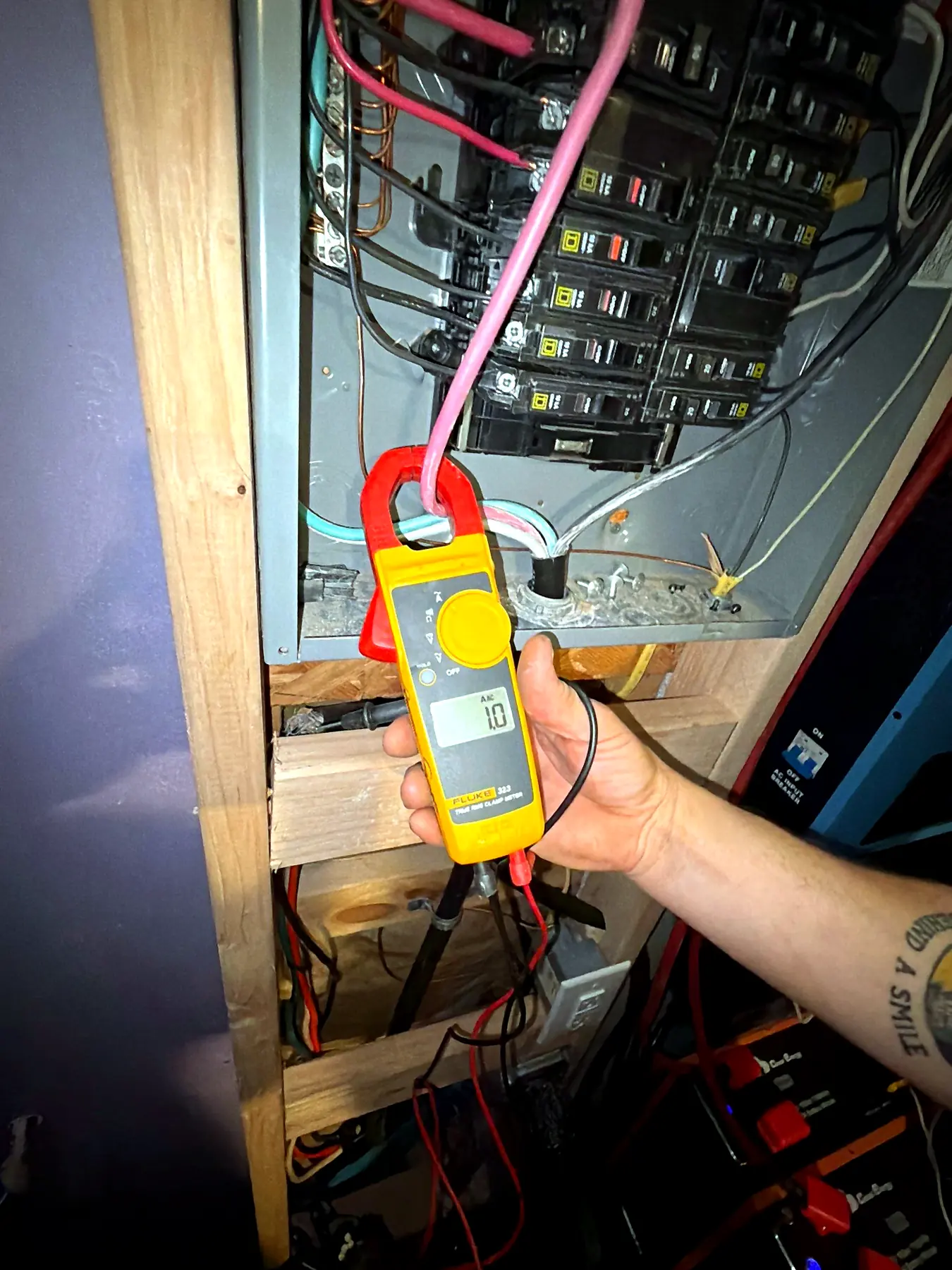 Electrician diagnosing a wiring issue