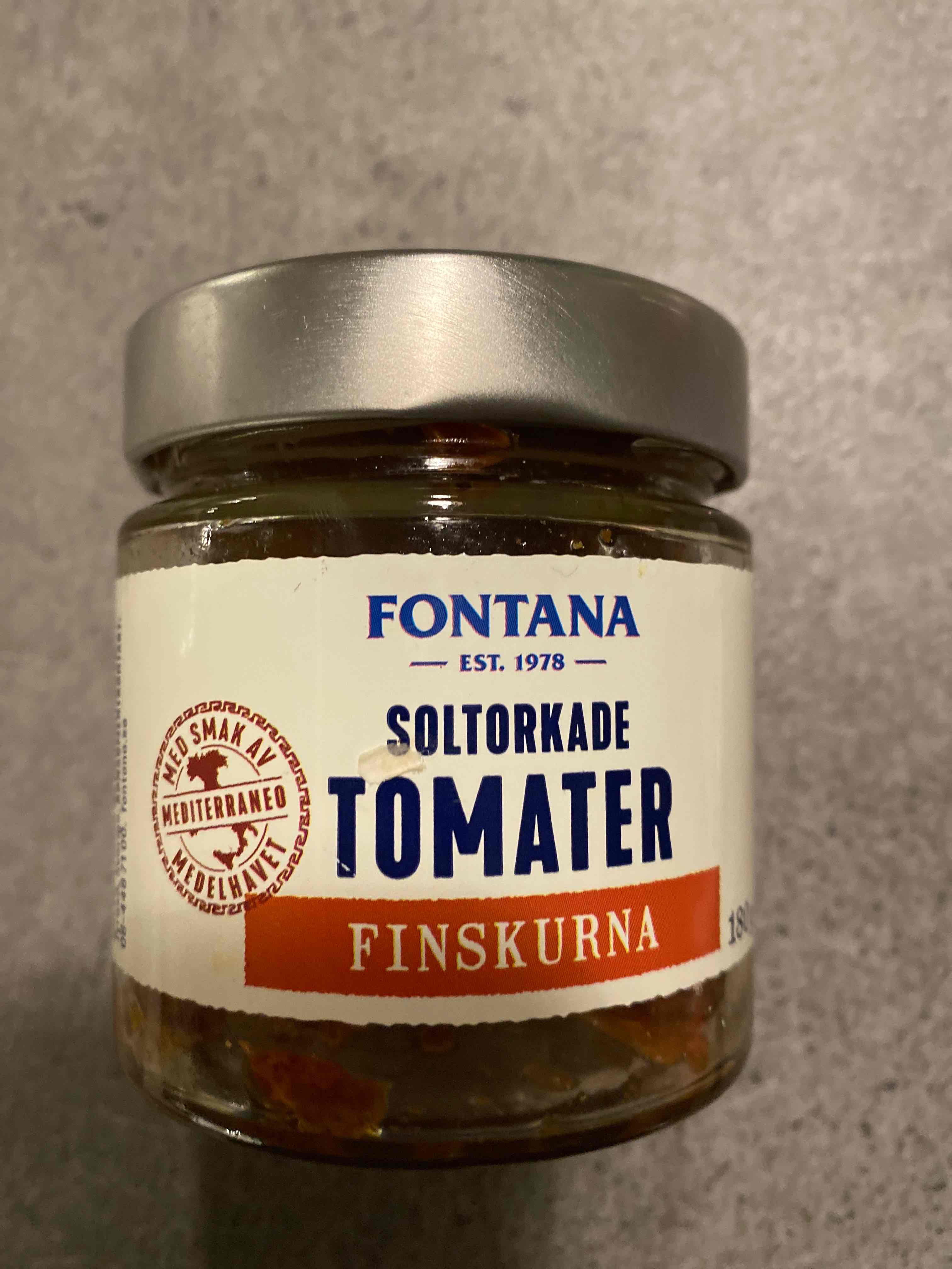 Soltorkade tomater finskurna