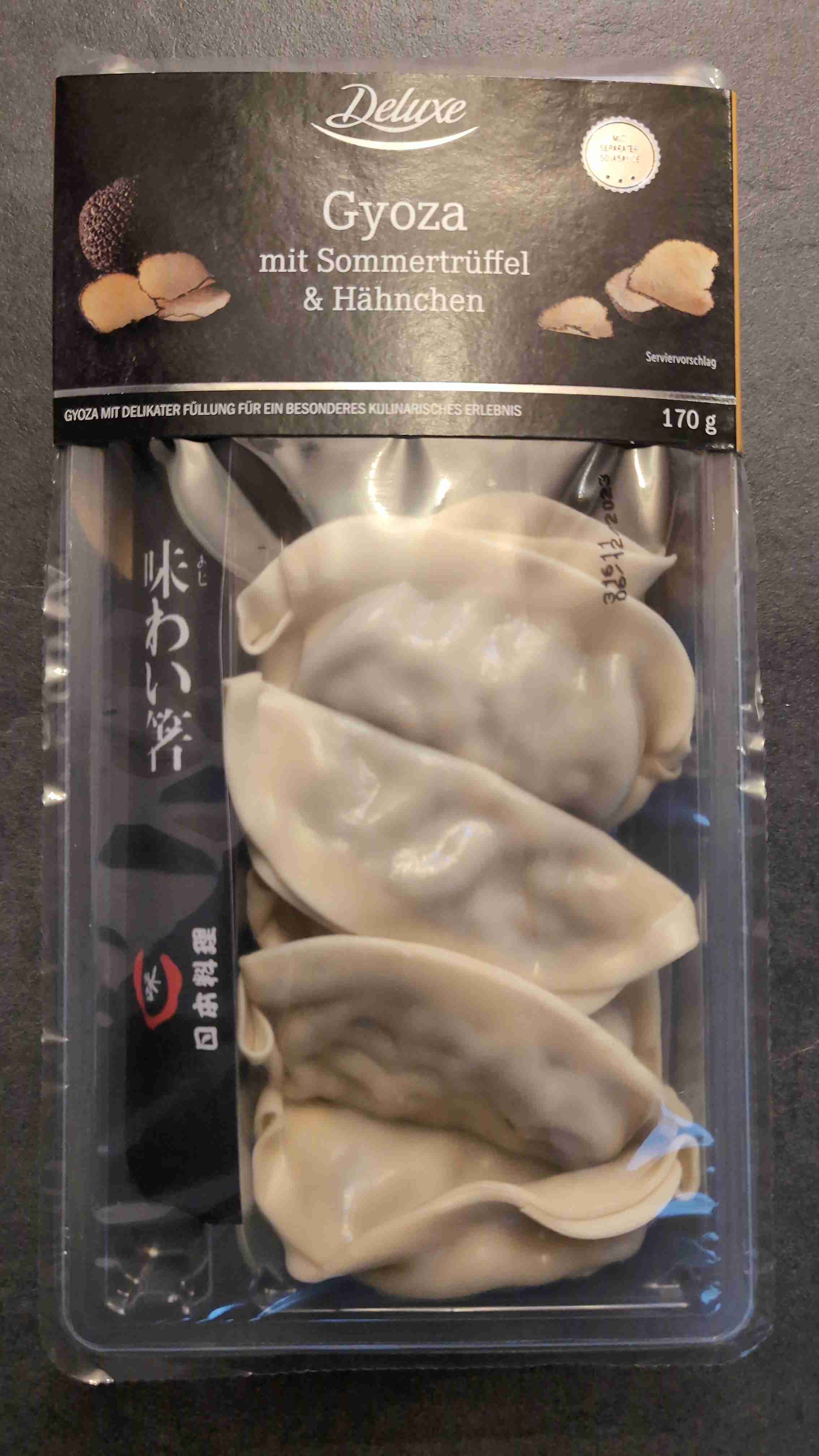 Gyoza mit Sommertrüffel und Hähnchen 