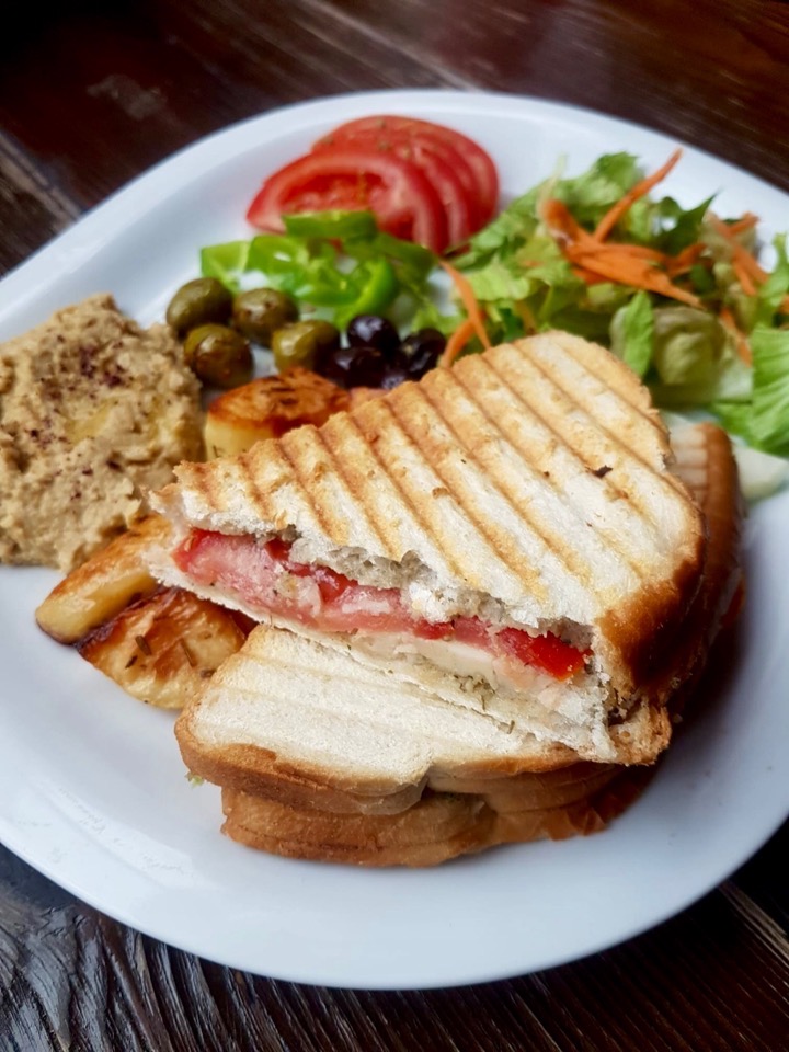 Breakfast plate with walnut pesto and cheesy toast