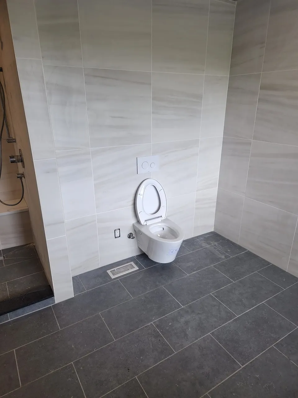 Gray tile bathroom with freestanding tub: Parisi Home Improvement bathroom project, photo 5