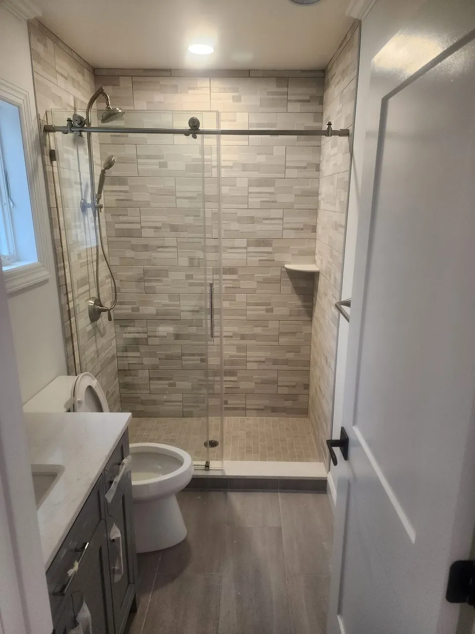Bathroom with brass fixtures: Parisi Home Improvement bathroom project, photo 3