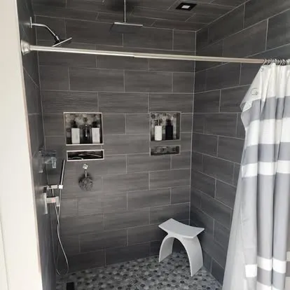 Gray tile bathroom with freestanding tub: Parisi Home Improvement bathroom project, photo 2