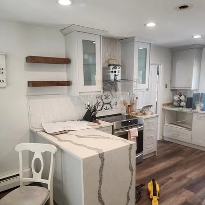 White shaker kitchen with waterfall island: Parisi Home Improvement kitchen project, photo 2
