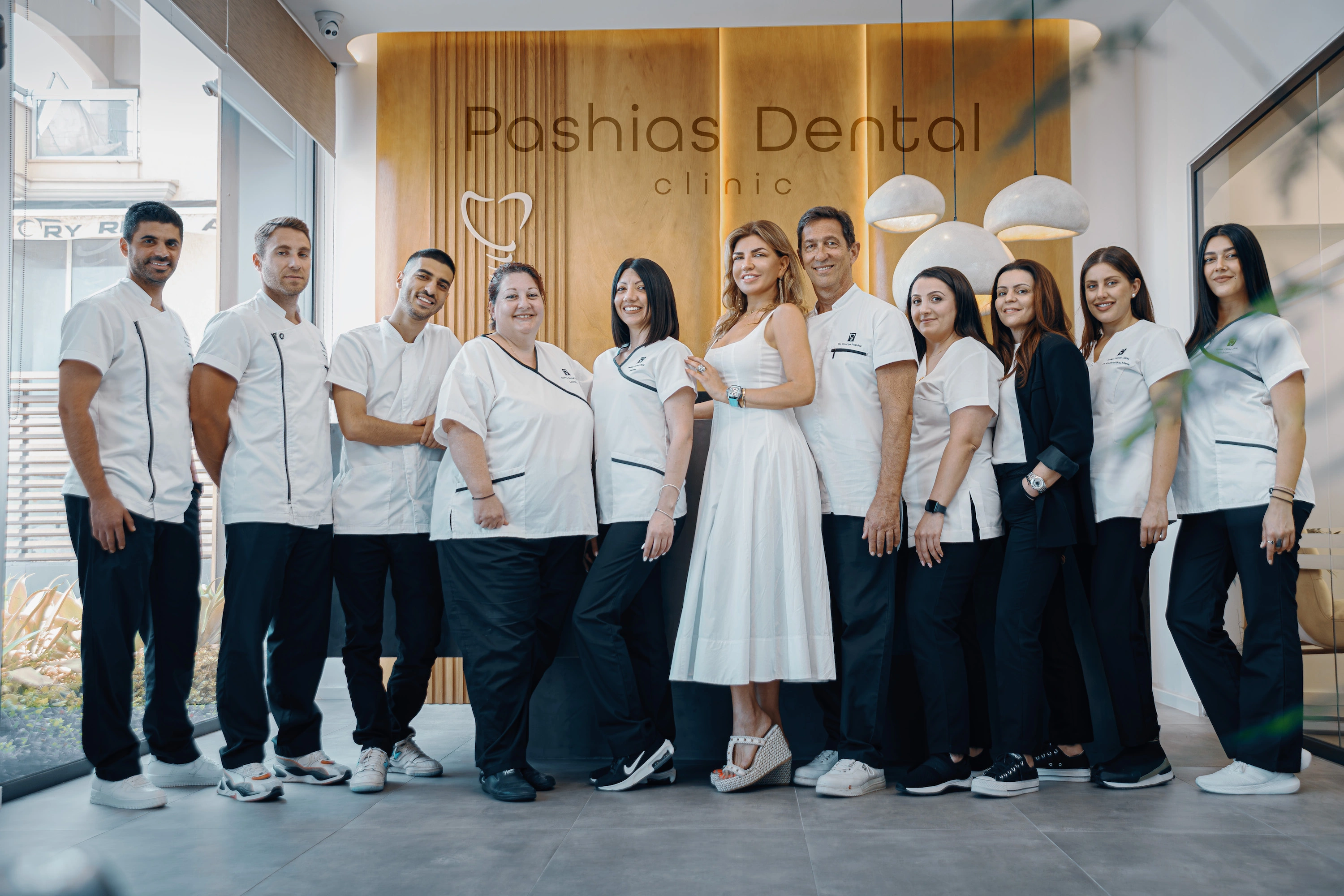The Pashias Dental Clinic team standing together