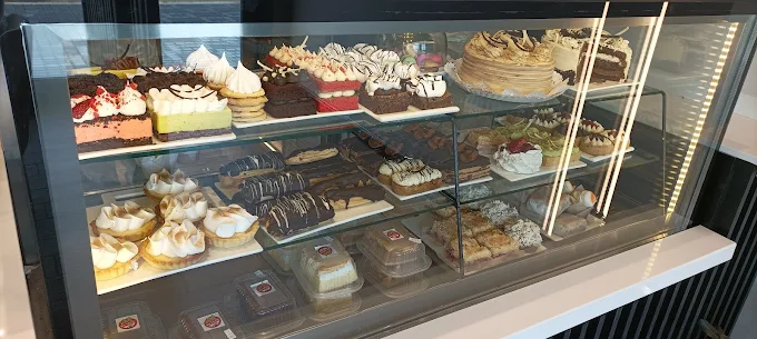 Ambiente aconchegante da Delicias de la Fuente Café em Trelew, Patagônia argentina — foto 3