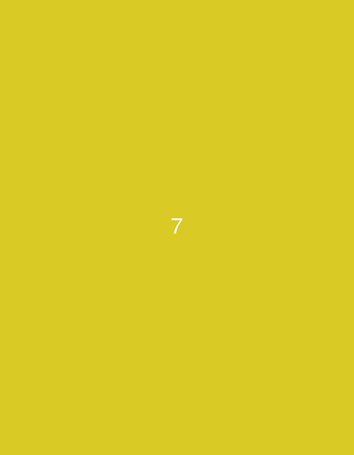 The image displays a plain, solid mustard yellow background. Centered on this monochromatic field is the white numeral "7". There are no discernible people, objects, or specific scenes present beyond the colored background and the single digit. No activity or event is taking place. The image provides no visual cues regarding the time of day, weather, or any emotions. Despite the provided location context of Iskar, Bulgaria, there are no elements within the image itself to suggest this geographical setting. The sole textual element is the number "7".