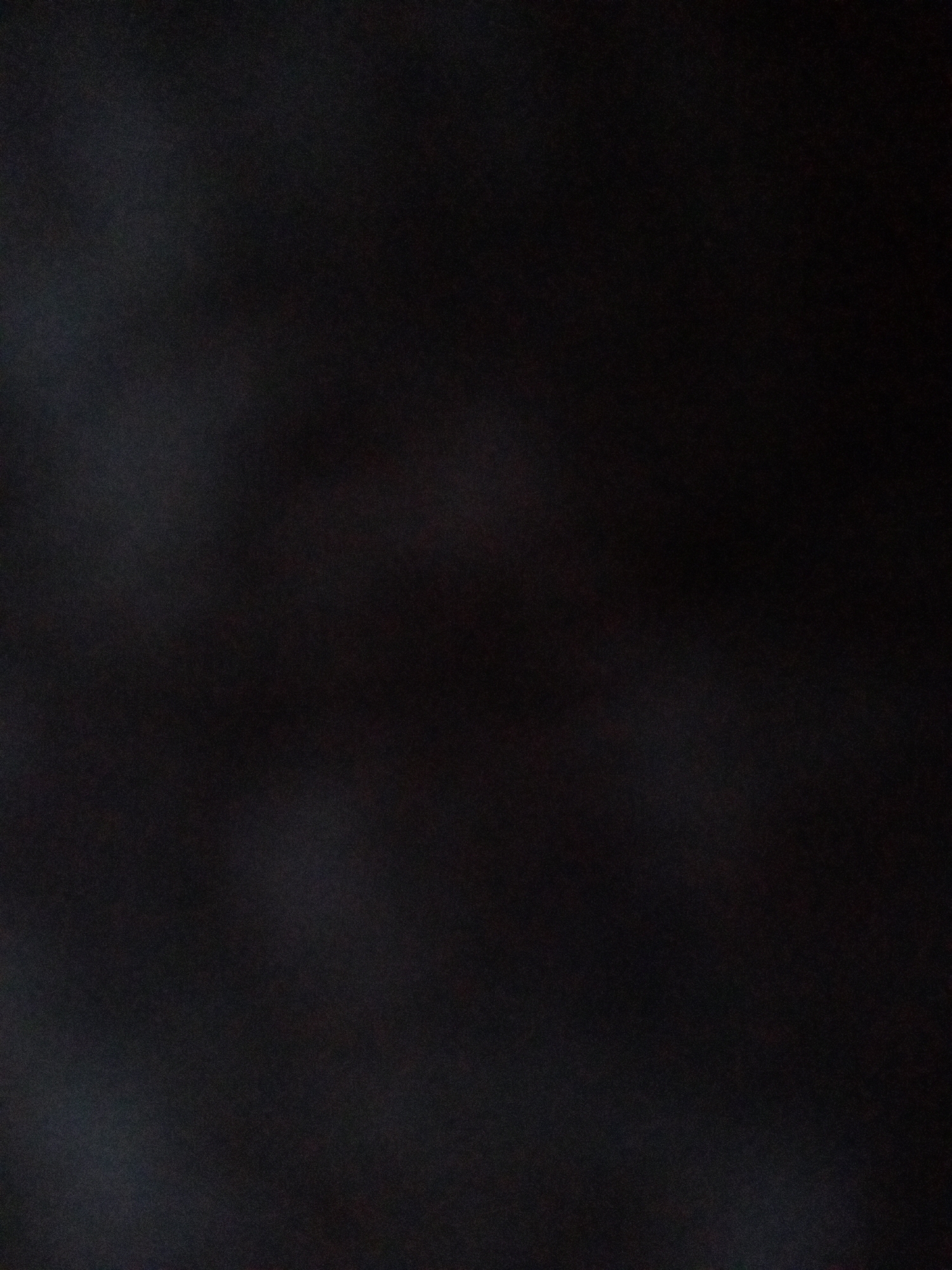 This is a dark, abstract image with no discernible subjects, objects, or environmental details. It does not contain any information about the city of Usman, Russia.