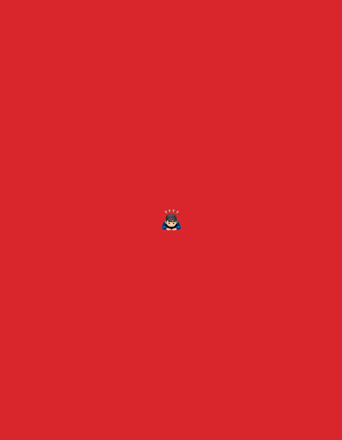 The scene depicts a minimalist, graphical composition set against a uniform, solid red background. Centrally positioned within this monochromatic field is a small, stylized human figure. The figure is characterized by dark hair and wears a blue upper garment. Its head is slightly bowed, and its hands are clasped together in front of it. Above the figure's head, several small, white, triangular shapes are depicted, radiating outwards, visually representing intense thought, stress, or steam emanating. The figure's posture and the radiating symbols suggest a state of deep concentration, contemplation, or mental overload. There are no other subjects, objects, or environmental details present. The image contains no visual information, such as geographical features, landmarks, or specific identifiers, to indicate a location in the city of Santa Ana, Venezuela, or any other specific geographical area.