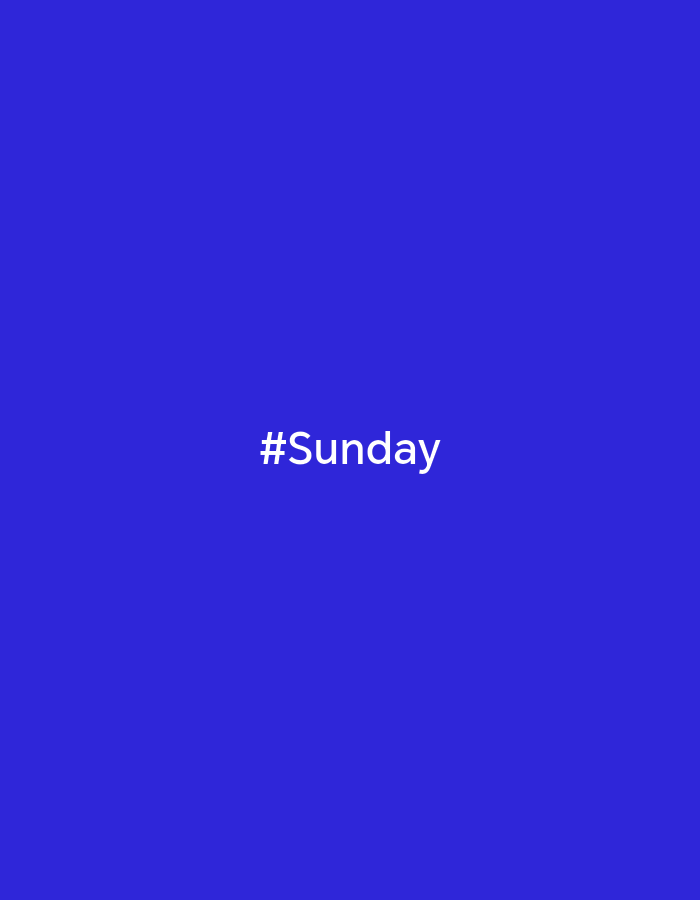 A medium shot of a blue background with the word "#Sunday" written in white in the center.