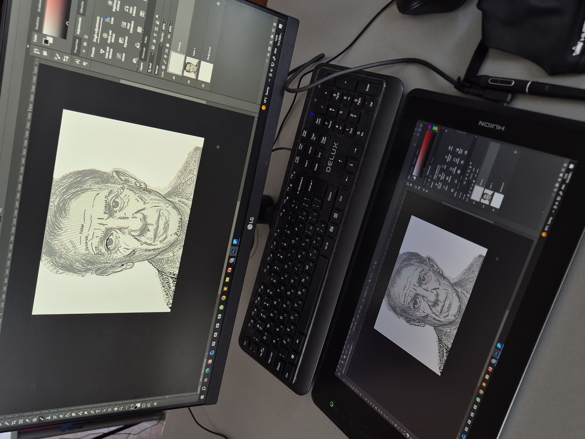 A digital artist's workstation is shown from a high-angle perspective, featuring two screens and peripherals on a light-colored desk. On the left is a large LG computer monitor, and to its right is a Huion drawing tablet. Both displays show digital art software, likely Adobe Photoshop, open to an artwork featuring a monochrome, line-art portrait of an older man. The portrait is uniquely composed of repeated text, primarily the word "Picasso" in various fonts and orientations, including "Пикассо" and "Picasso Pablo".
A compact black DELUX keyboard, equipped with both Latin and Cyrillic characters, sits between the two screens. A computer mouse and a black stylus with its case are also visible, indicating ongoing creative work. The software interface on both monitors displays various tools, adjustment panels (such as "Color", "Swatches", "Layers", "Brightness Contrast", "Hue/Saturation"), and open layers, with "drawing" and "Background" visible, set to "Opacity: 100%" and "Fill: 100%".
The taskbar on the LG monitor shows the time as "13:24", the date as "16.4.2026 г.", and the weather as "18°C Sunny". The language is set to "ENG". The presence of Cyrillic characters on the keyboard and in the date format aligns with the location context of Pavlikeni, Bulgaria. The overall scene suggests a focused digital art creation process.