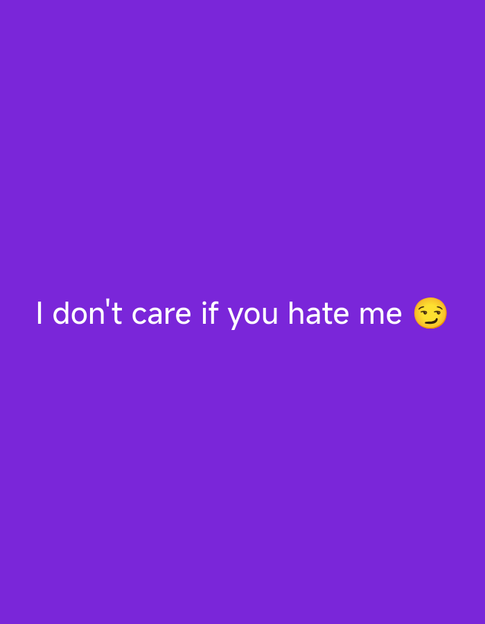 The image is a simple graphic with a plain purple background. Centered on the background is white text that reads "I don't care if you hate me" followed by a winking emoji. There is no discernible urban or natural environment, and therefore, no information can be provided about its location in Nsugpe, Nigeria, or any details regarding people, subjects, objects, actions, interactions, or the environment.
