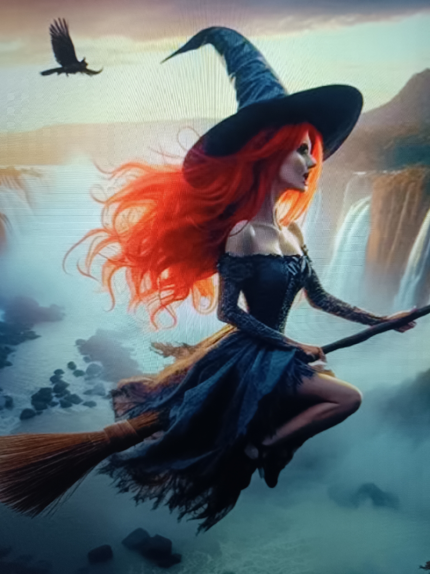 The media file depicts a fantasy scene of a witch with long, fiery red hair flying on a broomstick. She is wearing a pointed black hat and a dark, off-the-shoulder dress with lace detailing. Her expression is one of determination or focus. A black bird is visible in the sky to the left of the witch, and in the background, there are waterfalls cascading down rocky cliffs, suggesting a natural, possibly mountainous or canyon-like environment. The overall atmosphere is mystical and dynamic, with a sense of movement implied by the flowing hair and the airborne action. The lighting suggests it could be either dawn or dusk, with warm tones in the sky. The image does not contain any visible text. The provided location context of Taraz, Kazakhstan, does not align with the visual elements of the scene, which features waterfalls and rocky cliffs not typically associated with the geography of Taraz.
