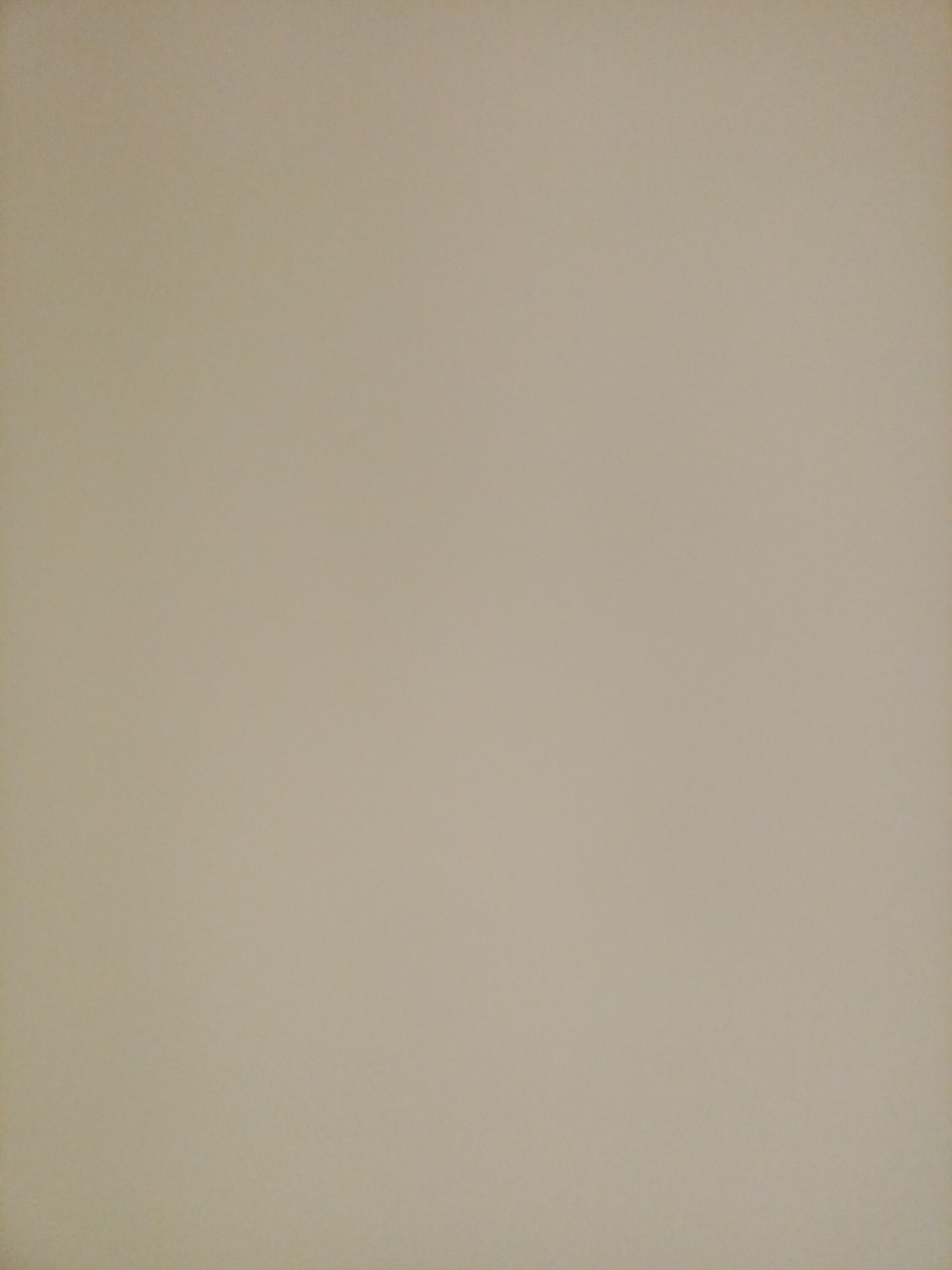 The image is a flat, neutral, light brown background. There are no discernible objects, people, or actions present. The scene is not located in Rostov-on-Don, Russia, or any other specific geographical location.