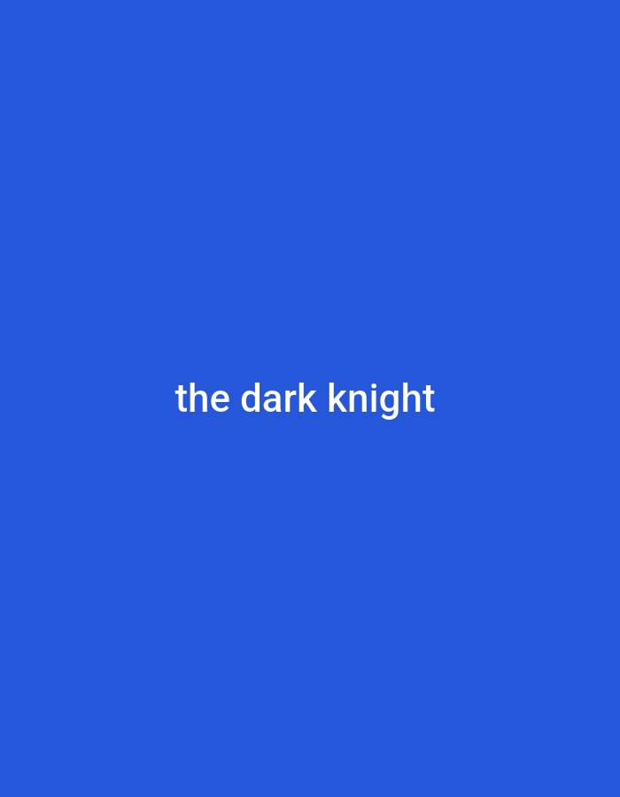 The image is a solid blue background with white text that reads "the dark knight" centered in the middle of the frame. The text is clearly legible. There are no other objects, people, or environmental details present in the image. The image does not depict any location in Lhokseumawe, Indonesia or any other city.