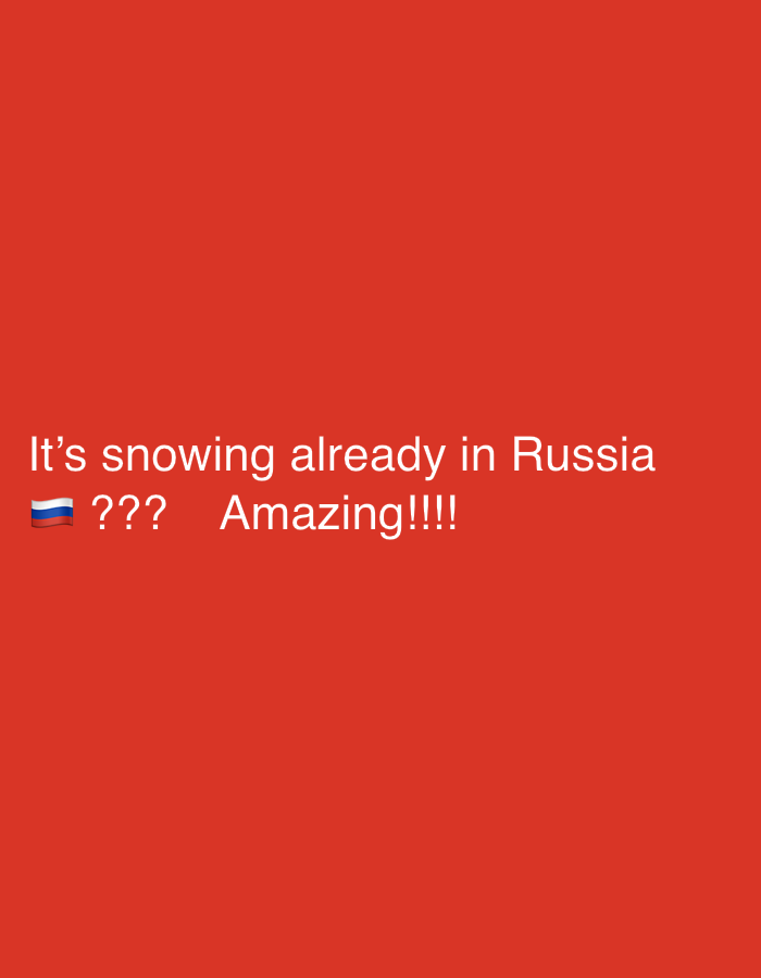 The image displays white text against a solid red background. There are no visible people, objects, or discernible activity within the frame.
The visible text reads: "It's snowing already in Russia 🇷🇺 ??? Amazing!!!!" The Russian flag emoji is included between "Russia" and "???". The text expresses surprise or excitement about early snowfall in Russia.
Given the provided context, while the image itself refers to Russia, the media file is contextualized as being from New Stadium, Nigeria. This suggests a potential discrepancy between the content of the image (text about Russia) and its intended geographic context. No specific time of day or other weather details are depicted beyond the mention of snow in the text.