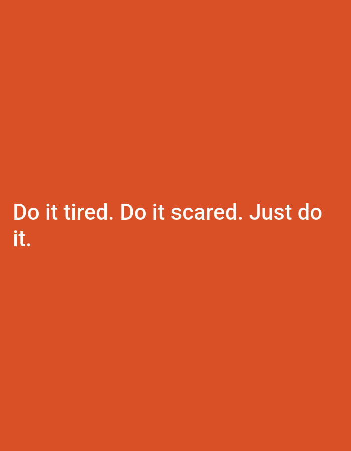 The image is a photograph with a plain orange background. White text is overlaid on the bottom left of the image. The text reads, "Do it tired. Do it scared. Just do it." There are no discernible elements related to the city of Keffi, Nigeria, or any specific environmental details.