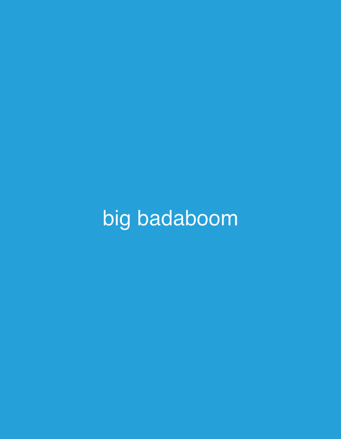 The image is a simple, solid blue background with the text "big badaboom" in white lettering centered horizontally and in the lower half of the frame. There are no discernible features related to the city of Vladivostok, Russia, or any other specific location. There are no people, subjects, objects, actions, or interactions depicted.