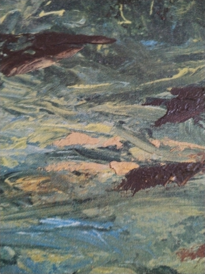 The image displays a close-up, abstract or highly impressionistic painting on a textile surface, likely canvas or fabric, which exhibits a visible weave pattern. The depicted scene provides no identifiable geographical features corresponding to the city of Sucina, Spain. The composition is characterized by broad, irregular strokes and textured areas. The predominant colors are dark greens, blues, and browns, intermixed with lighter tones of olive green, pale yellow, and peach. Irregular, dark brown masses with a raised, rough texture are observed in the upper left, mid-right, and lower right portions of the frame. Streaks of pale yellow and peach tones are present horizontally across the central region. No distinct people, identifiable objects, specific actions, or interactions are discernible within the abstract imagery.