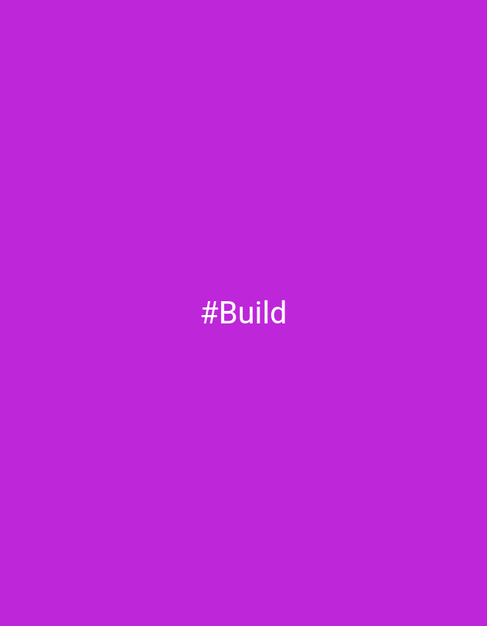 The image is a solid purple background with the white text "#Build" near the center. There is no indication of location.