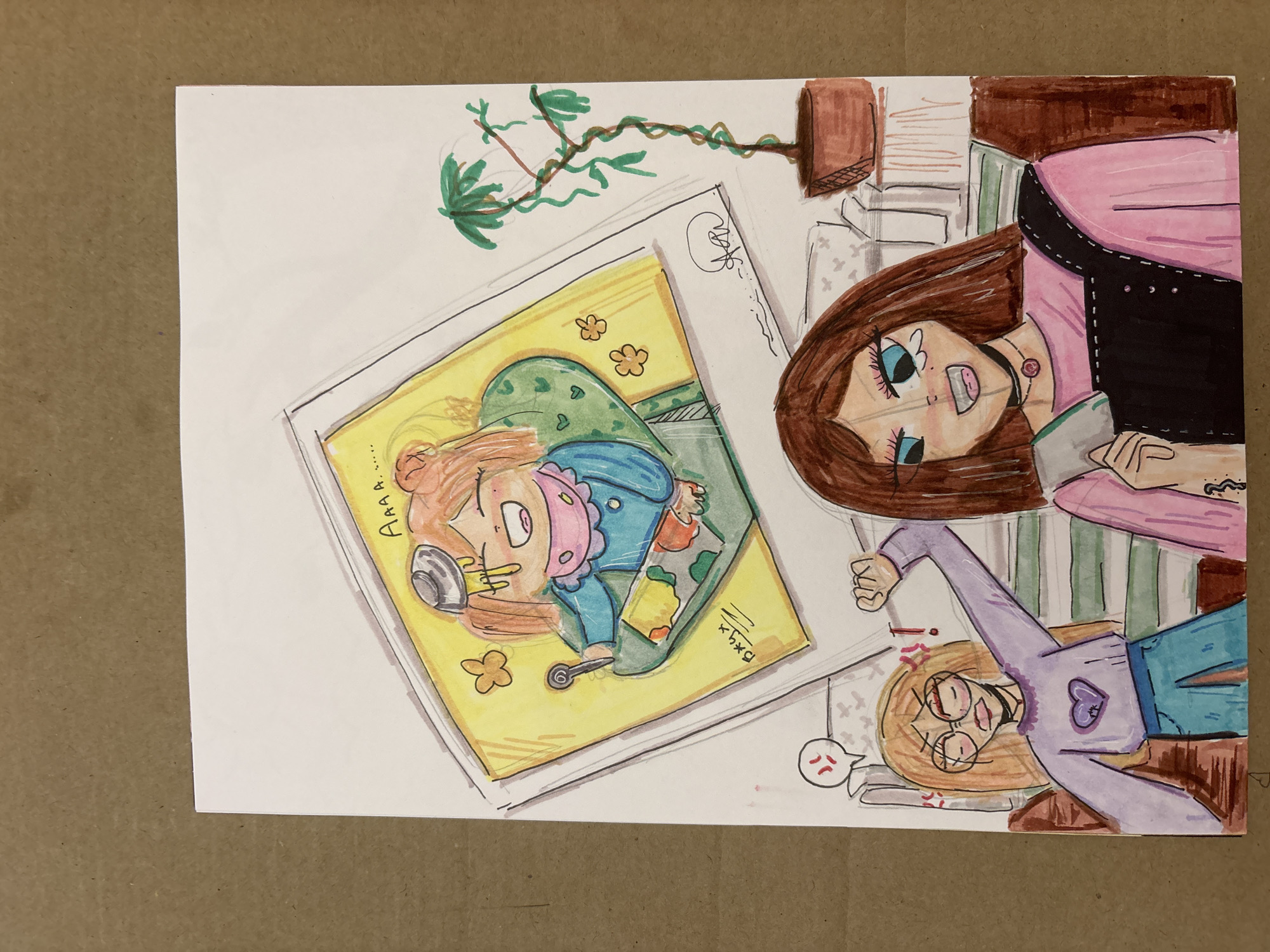 The image is a hand-drawn cartoon scene depicted on a sheet of paper placed on a brown surface. There are three cartoon figures present.
The primary focus is a large framed photograph of a child with auburn hair and a pink and blue outfit lying on a patterned green blanket on a yellow surface adorned with floral motifs. The child is wearing a mask and holding spoons. Text reads "Aaaa..." and "DxGx+."
Beside the photograph, on the right, a cartoon woman with brown hair is present, partially cut off by the edge of the paper. She wears a pink top and a black jacket with white stitching and silver studs. She has large blue eyes and wears a choker with a rose detail. She appears to be reading a book and sitting on a couch. A plant pot with a vine hangs above her.
Below the photograph, a cartoon figure lies on a striped surface. They have yellow hair and wear glasses. They are depicted in a purple shirt with a heart and blue trousers. They have an angry expression.
The image does not include any details about the city of Saint Petersburg, Russia.