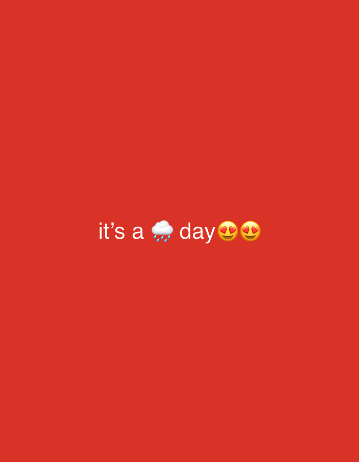The image is a plain red background with white text and emojis in the center. The text reads "it's a" followed by a cloud emoji with rain, and then the word "day" followed by two heart-eye emojis. There are no elements that could be used to identify a location in Kiblawan, Philippines.