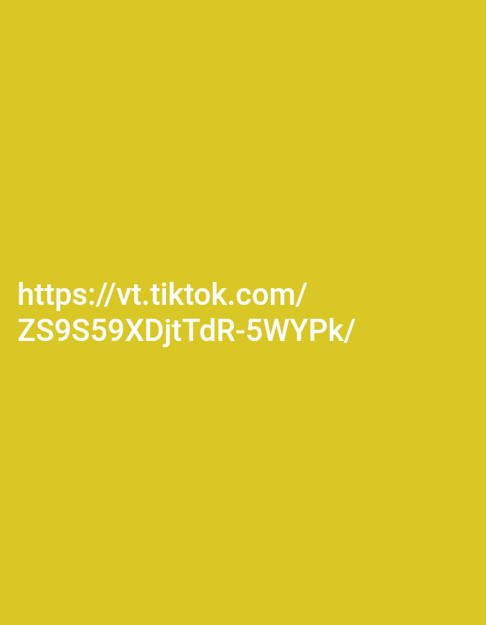The image contains text on a solid yellow background. The text reads "https://vt.tiktok.com/" and below that "ZS9S59XDjtTdr-5WYPk/". There are no people, subjects, objects, actions, interactions, or environmental details present in the image other than the text and background. There is no information about a location in Kendayakan, Indonesia.