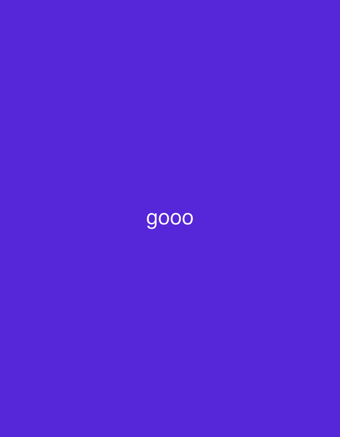 The image is a solid, vibrant purple background with the white text "gooo" centered horizontally and located in the lower portion of the frame. There are no people, objects, or environmental details visible. The location in Gendingan, Indonesia, is not discernible from the image.