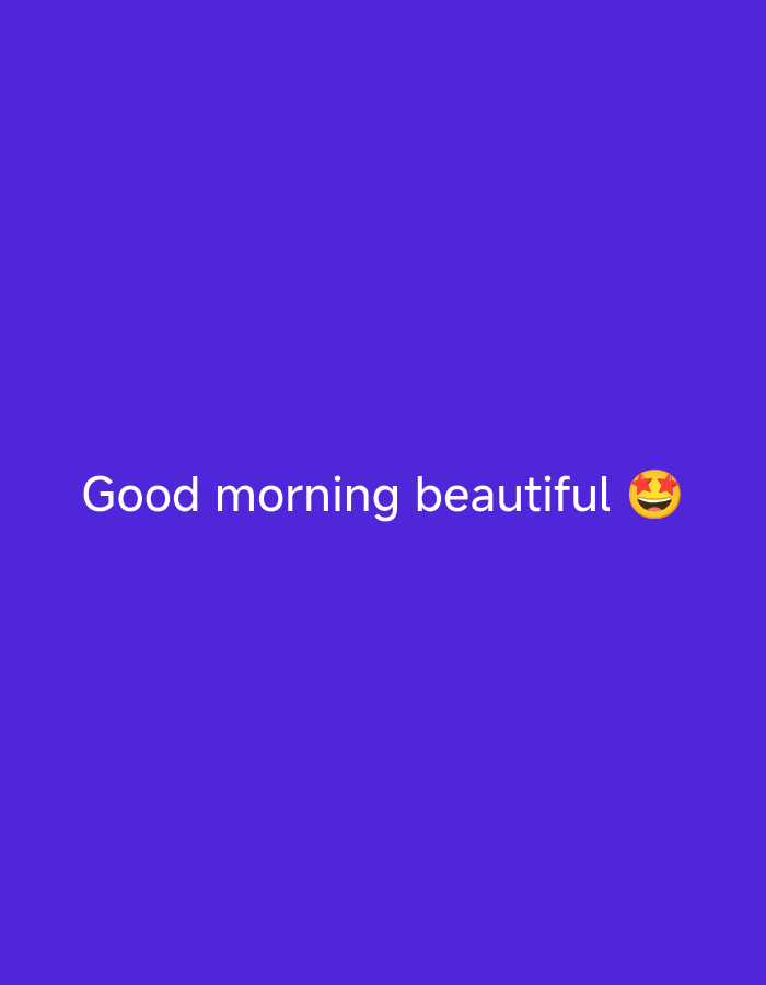 The image displays white text on a solid vibrant purple background. The text, in a sans-serif font, reads "Good morning beautiful". To the immediate right of the word "beautiful," there is a yellow emoji depicting a smiling face with two red stars in place of its eyes. The text and emoji are centered horizontally and appear in the lower middle section of the vertical frame. There are no discernible people, subjects, objects, or actions beyond the text and emoji. The environment is entirely a uniform color background, indicating no specific physical location in the city of Unknown, Unknown.