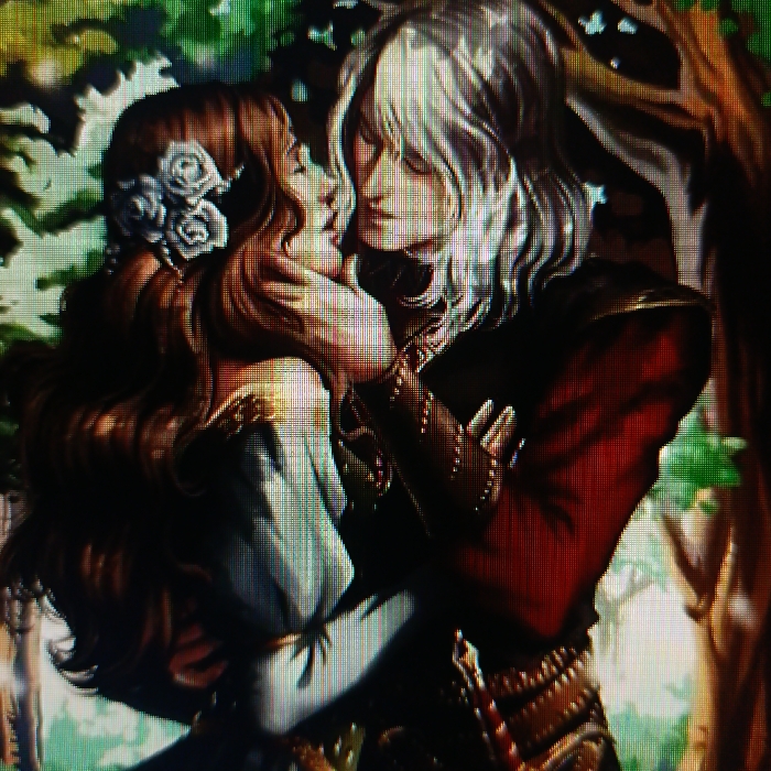 The image depicts a digital illustration or painting of two individuals, a male and a female, in an intimate embrace outdoors, in what appears to be a wooded or heavily vegetated area in the city of Hlybokaye, Belarus.
The female subject is positioned on the left, with her head tilted back and to the left, eyes closed or nearly closed. She possesses long, wavy brown hair adorned with three light-colored roses or similar flowers on the side of her head. She wears a light-colored garment, possibly a dress, with gold detailing on the shoulder. Her left arm is wrapped around the male's neck/shoulder. Her face is turned towards the male, with lips slightly parted, suggesting an impending or ongoing kiss.
The male subject is positioned on the right, his head tilted forward and to the right, eyes closed or nearly closed. He has long, wavy white or silver hair. He is attired in a dark upper garment, possibly a tunic or jacket, featuring a prominent red sleeve on his right arm (viewer's left) and ornate gold or bronze detailing on the sleeves and waist/hip area. His left hand (viewer's right) is gently cupping the female's chin or jawline, while his right arm (viewer's left) encircles her waist or back. His face is positioned very close to the female's, indicating a mutual moment of close physical contact.
The background consists of blurred green and brown tones, indicative of foliage, leaves, and tree trunks, suggesting a natural, outdoor setting, possibly a forest or garden. The overall image exhibits pixelation, indicating it is a photograph of a digital screen or a low-resolution digital reproduction of an artwork.