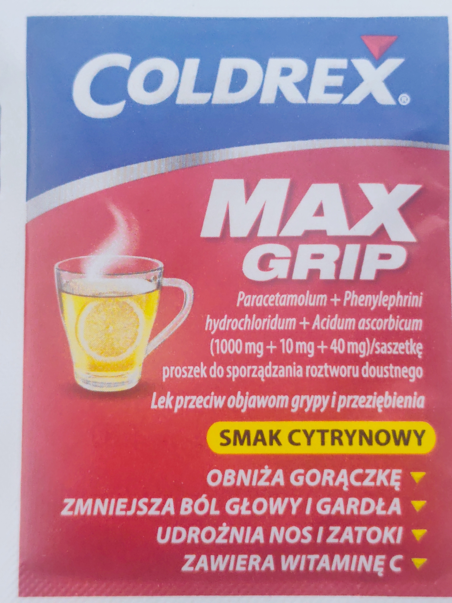 The image is a close-up of a product package for "COLDREX MAX GRIP" medication. The packaging is predominantly red and blue, with white text. Prominently displayed are the brand name "COLDREX" in large white letters on a blue background, and the product name "MAX GRIP" in large white letters on a red background. A stylized image of a mug of hot drink with a lemon slice is visible. Below the product name, there is text listing the active ingredients and the intended use of the product for flu and cold symptoms. A yellow oval shape contains the text "SMAK CYTRYNOWY" (Lemon Flavor). Further down, bullet points describe the benefits, such as reducing fever and relieving headache and sore throat. The image does not contain any information about the city of Szczecin, Poland, nor does it depict any people, actions, or interactions. The environment is solely the product packaging itself.
