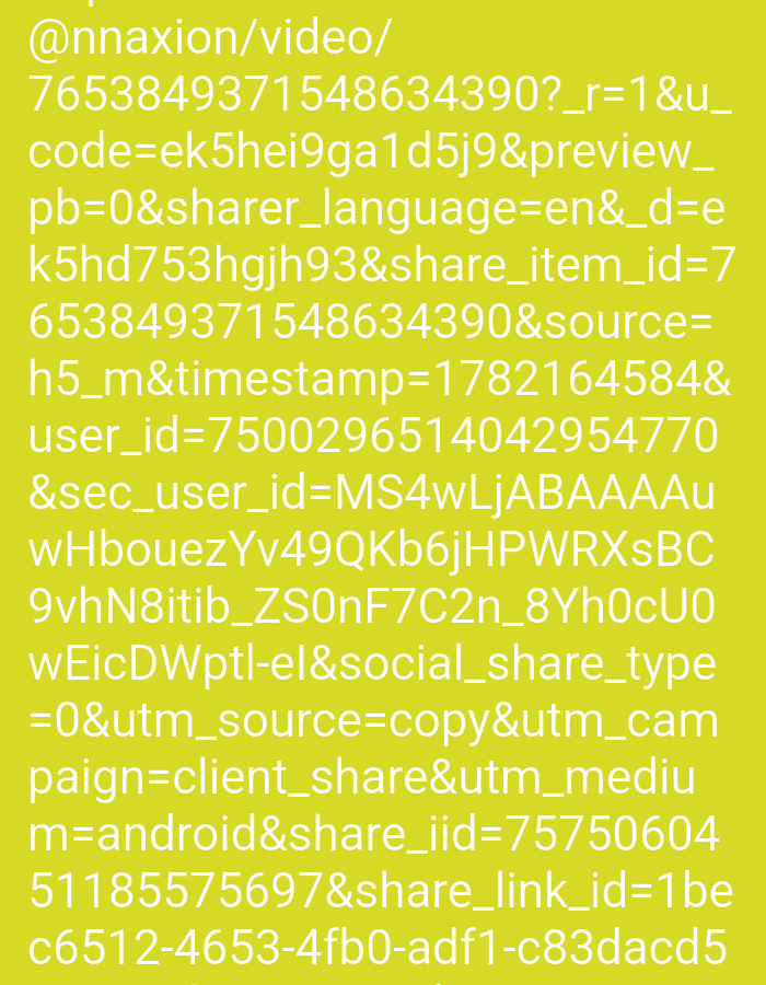 The image shows a bright yellow background with white text. The text is a URL or a series of parameters, likely from a web link. It contains a mix of letters, numbers, and symbols, including "@nnaxion/video/", "code=", "preview_", "sharer_language=", "timestamp=", "user_id=", "sec_user_id=", "social_share_type=", "utm_source=", "utm_campaign=", "utm_medium=", and "share_iid=". There is no information in the image that suggests a specific location in the city of Jos, Nigeria, or any other geographic context. The image is purely textual and does not depict any visual elements that could be used to identify a physical scene or location.