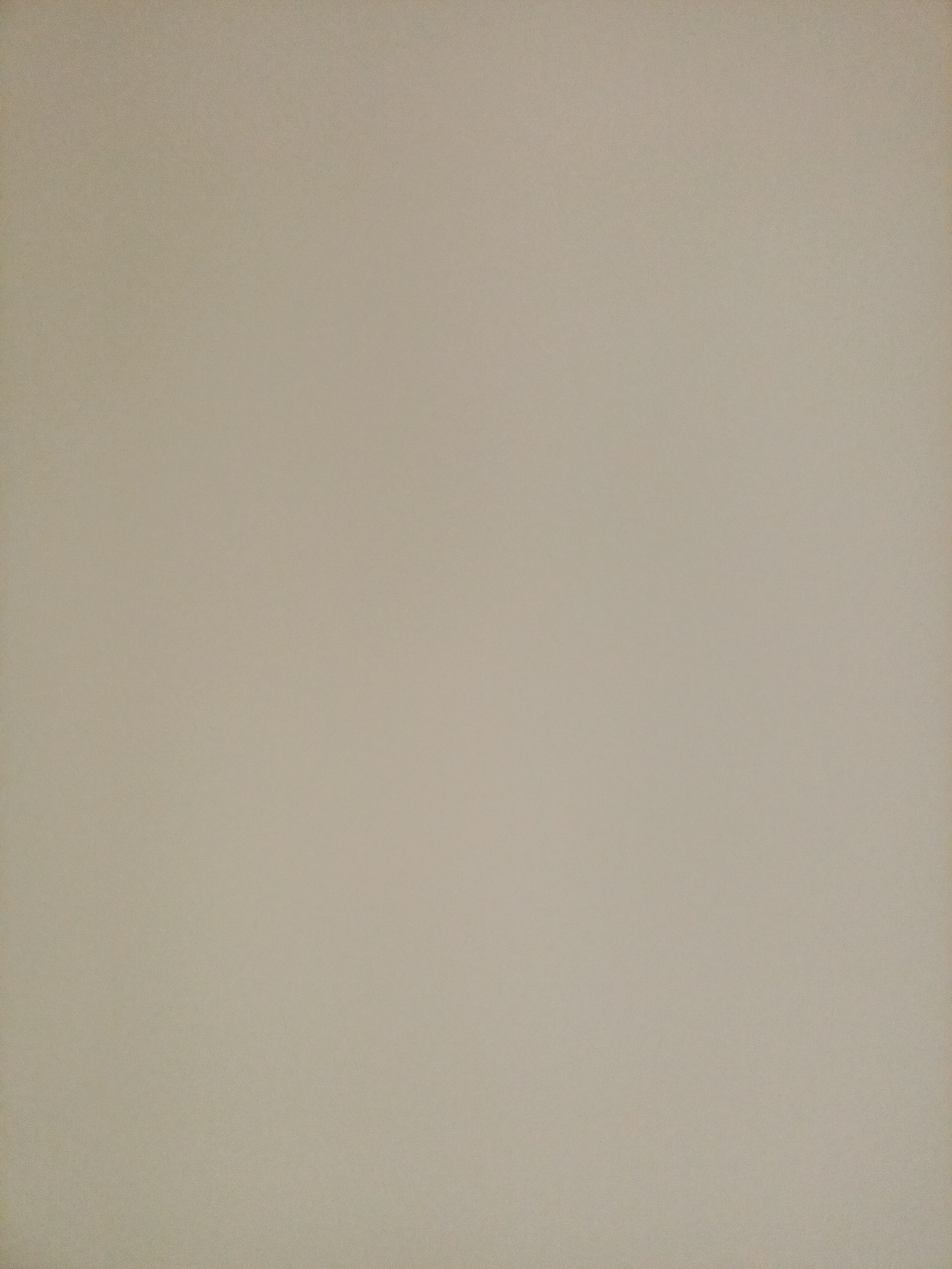 The image is a plain, light brown background. There are no people, subjects, objects, or actions visible. The scene is a uniform, textured surface, possibly a wall or paper. There is no indication of its location in Rostov-on-Don, Russia, or any other specific location.