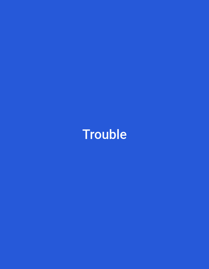 The image is a plain blue background with the word "Trouble" centered in white text. There is no depiction of the city of Ketegan, Indonesia or any specific scene.