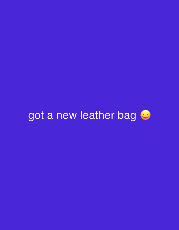 The image is a plain purple background with white text that reads "got a new leather bag" followed by a smiley face emoji with its tongue sticking out. There is no discernible location, city, or any other environmental details present in the image.