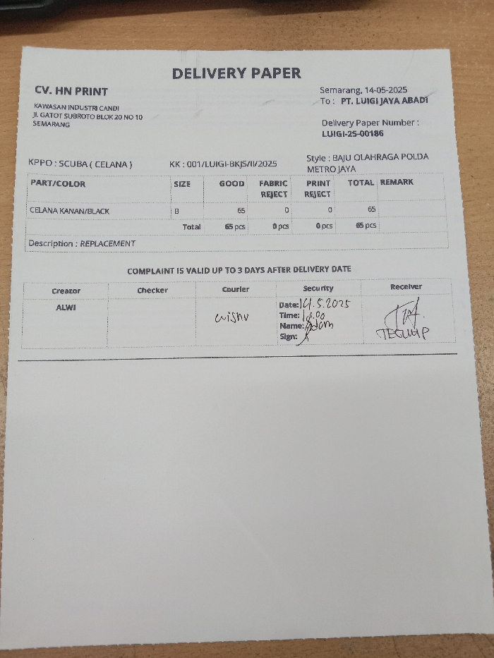 The image shows a delivery paper for CV. HN Print, located at Kawasan Industr Candi, Jl. Gatot Subroto Blok 20 no 10, Semarang, Indonesia. The delivery paper is for PT. Luigi Jaya Abadi, with a delivery paper number of LUGI-25-00186. The delivery is for 65 pieces of "Baju Olahraga Polda Metro Jaya", with a "size B", and includes a "Replacement" description. The delivery is confirmed by "Alwi" as the creator and "Wishv" as the courier, with "Adam" as the security who signed the paper at 14.58 on 14.05.2025. "Tria" is listed as the receiver. The delivery paper was received at the location indicated by the coordinates (-7.01, 110.364), which is located in the Kecamatan Ngaliyan district of Semarang, Indonesia. The paper is a standard white paper with a handwritten form filled out in black ink.