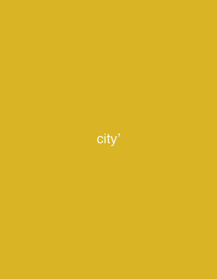 The image displays a minimalist scene featuring a solid, uniform mustard yellow background. Centered on this background is the white text "city'" rendered in a simple, sans-serif typeface, with a distinct apostrophe positioned directly after the 'y'. No other subjects, objects, people, or actions are depicted within the frame. The environment is entirely composed of this monochrome yellow field. This scene is presented in the context of the city of Casablanca, Morocco, although the image itself does not visually include any specific geographical features or landmarks of that location.