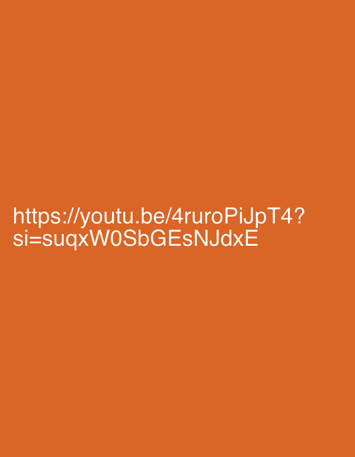The image displays a plain orange background with white text. The text reads "https://youtu.be/4rurqPiJpT4?si=suqxW0SbGEsNJdxE". There are no people, subjects, objects, actions, interactions, or environmental details visible in the image, and therefore it is not possible to determine any location within Mumbai, India, or any other geographical context.