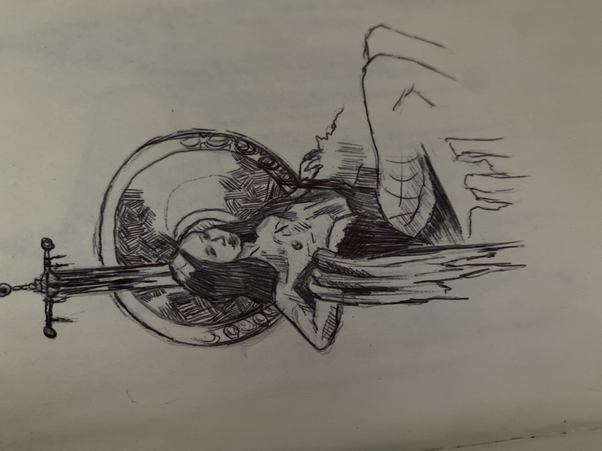The image is a pen and ink sketch on paper, depicting a stylized angel-like figure lying on its back. The figure has long, dark hair and appears to be nude, with its breasts visible. The figure's face is visible, with closed eyes, suggesting a state of rest or perhaps death. The figure is positioned diagonally across the frame, with its head towards the left and feet towards the right.
Behind the figure, to its left, is a large, circular object resembling a shield or a halo. It has an ornate border with decorative elements. The interior of this circular object is filled with cross-hatching, creating a textured pattern.
Piercing through the figure and the circular object is a sword. The sword is depicted with a detailed hilt, and its blade extends across the image. The figure's left arm is bent, with its hand resting near its head, while its right arm is extended downwards.
To the right of the figure, what appear to be large wings are sketched. These wings are rendered with rapid, energetic lines, suggesting feathers or a powerful, outstretched form. The overall style of the sketch is rough and expressive, with a focus on line work and shading to create form and depth.
The background is a plain, off-white surface, likely paper. There are no discernible environmental details, time of day, or weather cues. The emotion conveyed by the figure is ambiguous, potentially one of peace, sorrow, or ethereal beauty. No text is visible in the image. The location context of Zhmerynka, Ukraine, does not offer any direct visual cues within the sketch itself.