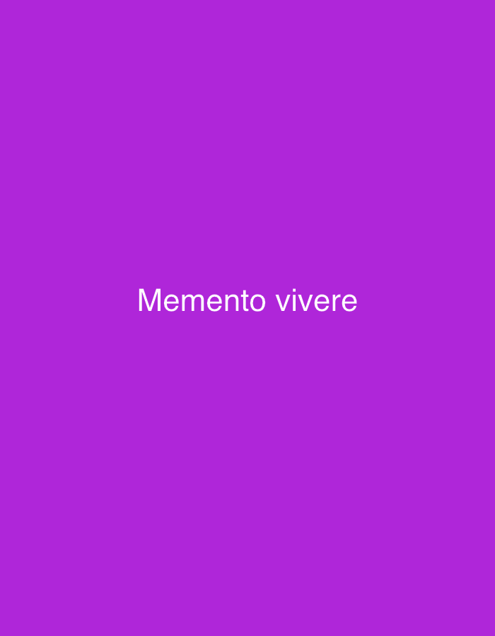 A solid purple background displays the white text "Memento vivere" centered horizontally. The background is a uniform color with no discernible environmental features or context. No people, subjects, objects, actions, or interactions are present in the image. The location in the city of Vilnius, Lithuania, is not visually represented or implied by the image content.