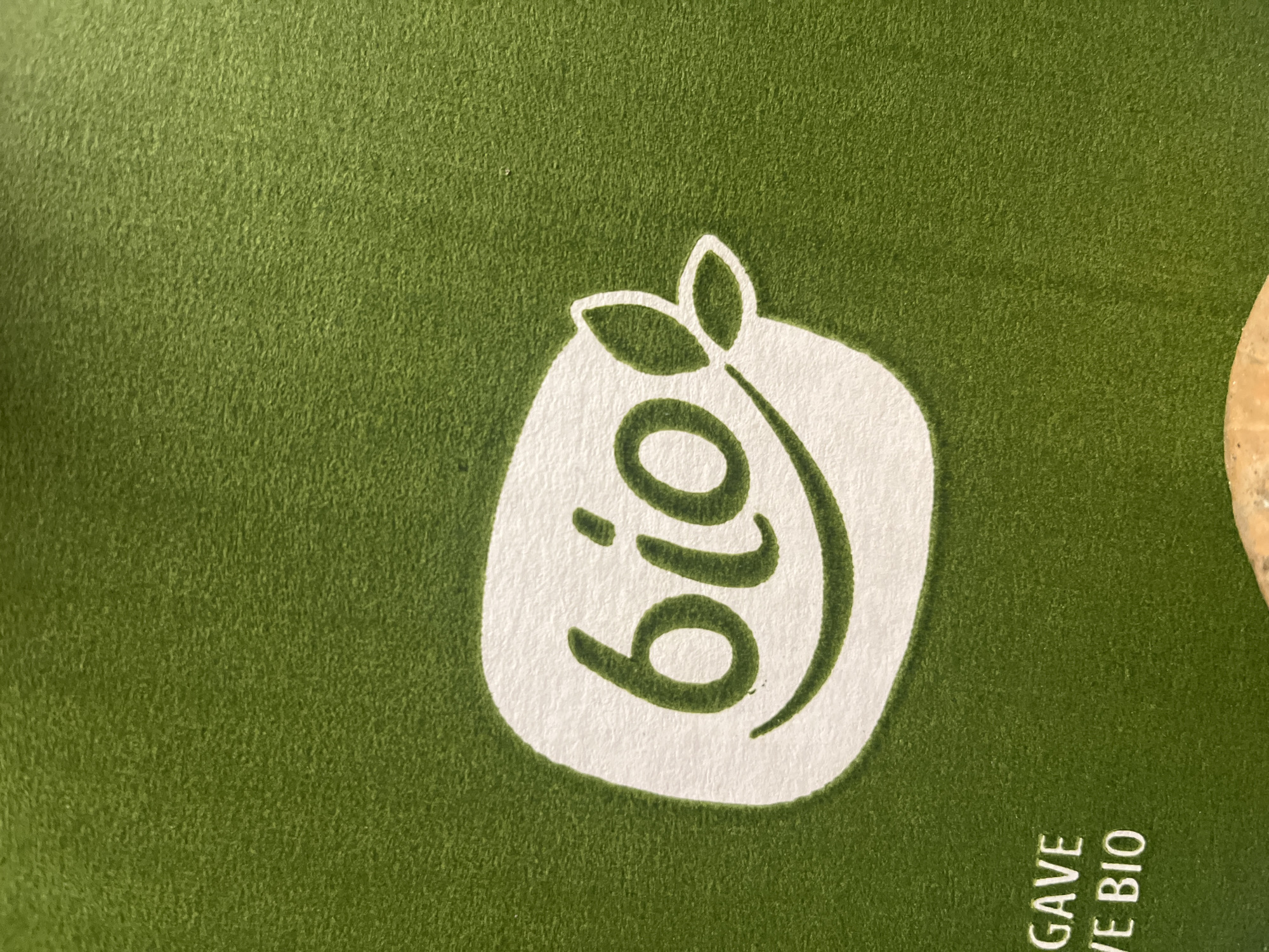 The image shows a green background with a white "bio" logo shaped like an apple with two leaves at the top. The word "bio" is written vertically, with the "i" dotted with a leaf. The phrase "GAVE VE BIO" is partially visible in the bottom right corner. The location in Varna, Bulgaria, is not discernible from the image.