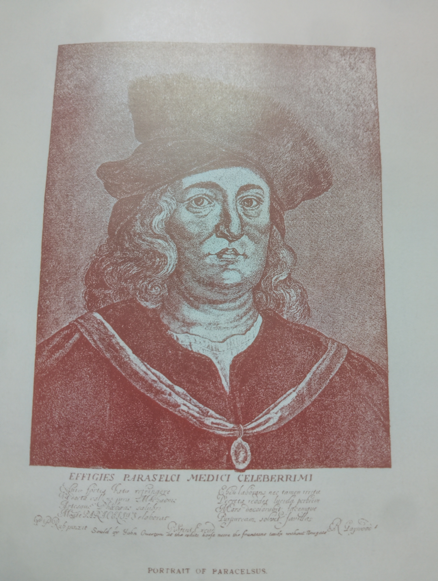 The image is a portrait of a man wearing a hat and a robe, with a medal around his neck. The portrait is done in a sepia tone with a light background. Below the portrait, there is text written in a script font. The text appears to be a Latin inscription and a signature. The bottom of the image has the words "PORTRAIT OF PARACELSUS." The image does not contain any identifiable landmarks or elements that would indicate its location in Alagbado, Nigeria. Therefore, no description of the scene within that city can be provided.