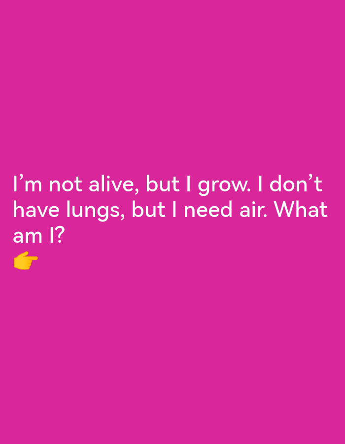 The image is a riddle presented on a solid magenta background. The text of the riddle reads: "I'm not alive, but I grow. I don't have lungs, but I need air. What am I?". Below the text, there is a yellow pointing finger emoji. There is no information about Ikorodu, Nigeria in the image.